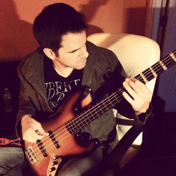 A rare shot of me playing bass, working out the bassline for "Inside Out."
