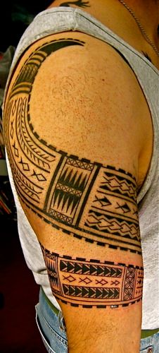 Modern Samoan-style warrior battle club arm-wrap, side view
