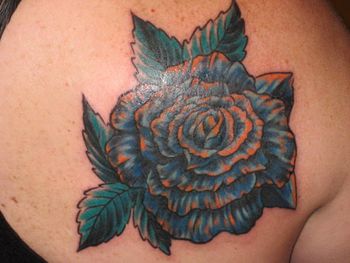 Blue & orange rose complete the cover up
