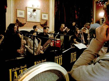 Sefton Youth Jazz Reunion (2005), Mark Jones boosting the front horn section playing baritone sax amongst many already talented members!
