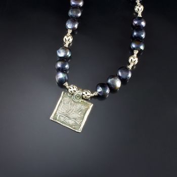 Pearly Lotus - original art work in fine silver with black peacock pearls.McKenzie's Jewelry by Nancy Koehler.Sold

