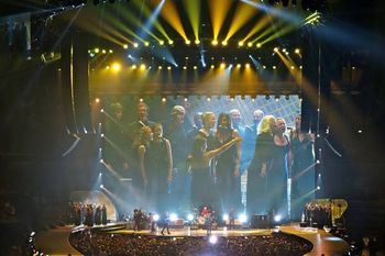 Members of GHOSTLIGHT and the Washington Chorus performing with the Rolling Stones at the Verizon Center in Washington DC. Conductors Dr. Evelyn Troester DeGraf & Elena Willamson
