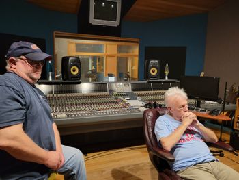 Greg Miller and Music Producer Larry Rogers talek to the band
