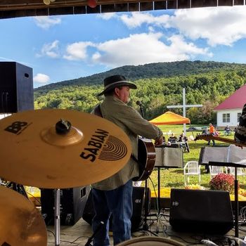 Trent thrills the crowd at the COCC Fall Festival with one of the band's gospel songs.
