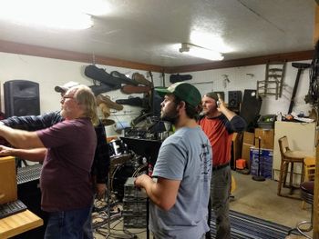 Tyler Sisco, Steve's son and songwriter looks on as Dewayne plays back the vocal track Trent just paid down on one of Tyler's songs.
