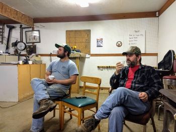 Father and son songwriters, Tyler and Steve Sisco watch as Trent lays down the vocal track on one of their songs.
