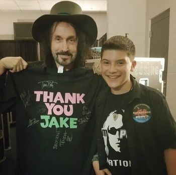 Jake with Mike Campbell, founding member and lead guitarist for Tom Petty and the Heartbreakers, backstage at Prudential Center.
