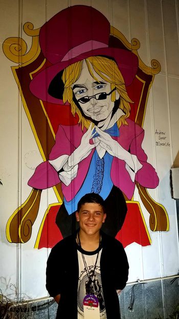 Jake in front of artwork dedicated to Tom Petty in Gainesville, Florida.
