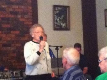 Past Lifetime Achievement Award winner Eva Barrow sings Suppertime at the luncheon.
