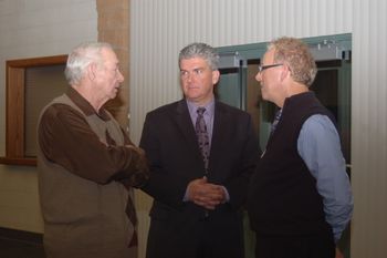 Harold O'Neal visits with Matt Throgmorton and Mike Reuter.
