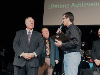 P.D. Murdich presents Brian Lester with the LAA
