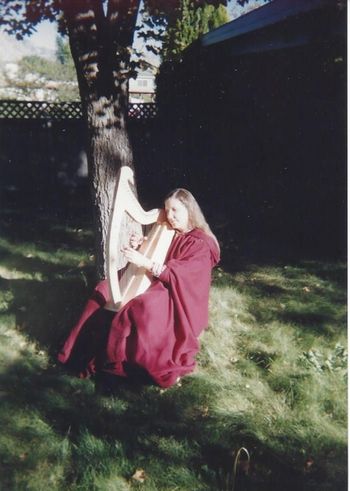 Carol_with_Harp_in_back_yard
