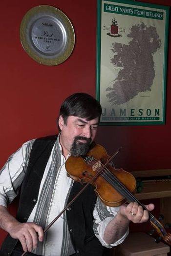 Dave Sharp Dave playing Irish fiddle at MacCool's Public House
