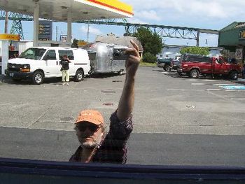 I was fascinated with the Airstream's refection in the mirrored window. Marie waits patiently.
