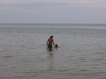 hawk swims with dad 2
