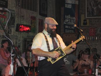 Rev. Peyton playing his LJK cigar box guitar at Ground Zero Blues Club - Clarksdale MS
