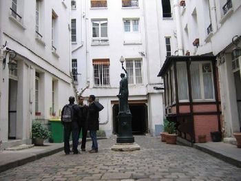 Mario, Mohamid, and Claude outside of Melodie 7 in Paris
