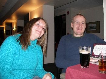 Marci and Marc pause for a beer and a smile.
