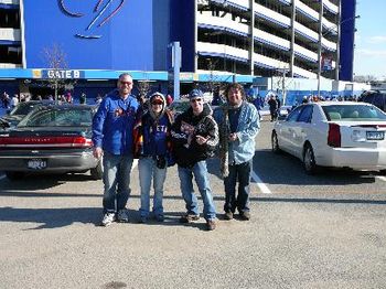 Scully, Jules, Chris and JL in front of Shea...or, what we like to call, "Home."

