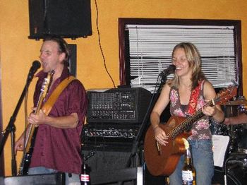 Brother and sister singin' together.
