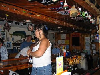 Great bartender, Michele, and fishing Christmas ornaments above.
