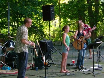 Marc, Elizabeth, Jules and JL sing the chorus of "Yellow Submarine".
