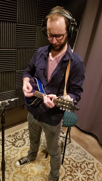 Matt Duranceau laying a mandolin track.
