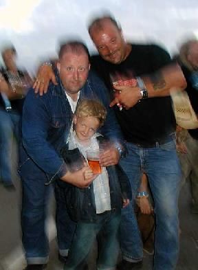 Steve and Pete taking beer from a 7 year old, not sure if the subjects are wobbling or the photographer.
