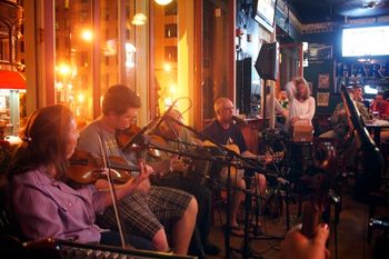 All-Ireland fiddle great Dylan Foley stopped by Jeanne's session on his cd tour. With John Tabb, Danny, and Eileen MacCallum (photo by Patrick Freeman)
