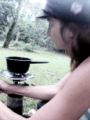 making coffee in the ancestral swamp cemetery.
