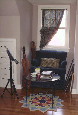 Found the curtain at Cost Plus, the blue chair was Grandma Hildred's, the pillow my friend Sharon ga
