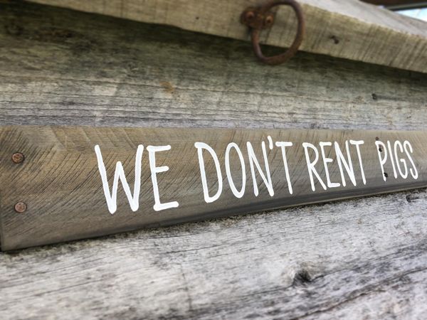 We Don’t Rent Pigs Reclaimed Wood Sign
