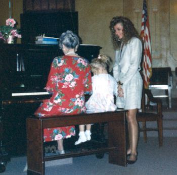 Holly 5 yrs. old with piano teacher & mom
