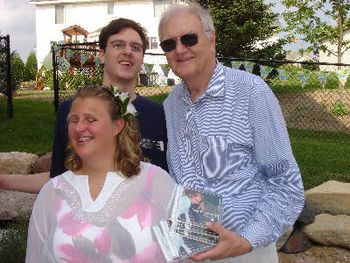 Holly, Skip and Cliff with a pile of CDs to take home
