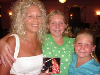 Janie with her nieces after purchasing my new album.  Their favorite song is "Coming of a Storm"
