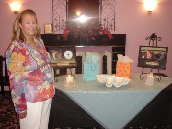 I am posing with the commerative plaques of my two albums
