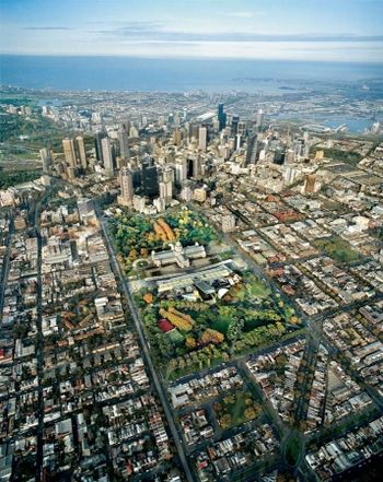 The "impressive building" described in relation to the photo I named "The Fountain" is The Royal Exhibition Bldg at Carlton Gardens, Melbourne, Australia: areal view shown.
