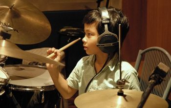 My little brother Panhlauv recording at the drums

