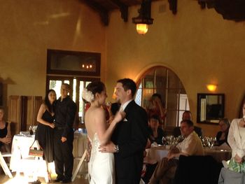 The happy couple share their first dance.
