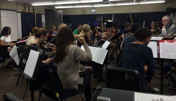 The Berklee World Strings Eugene Friesen (on the right) gets the Berklee World Strings ready to rehearse Toubab, my piece for string orchestra
