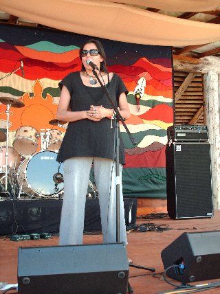 Singing for the people at the 2007 Komasket Music Festival. Beautiful site, people, and festival!! T
