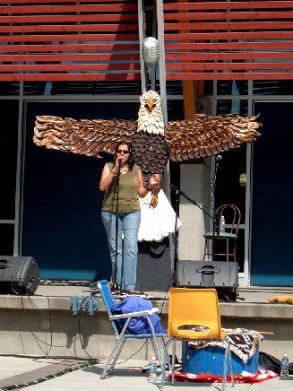 On Common Ground festival in Kelowna, BC. I like this photo. The eagle, me, and the powwwow drum bel
