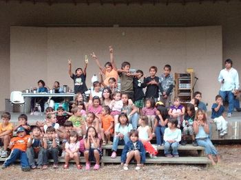 Me 'n' the kidz after a performance at this years Squilax Powwow. That's me in the middle, surrounde
