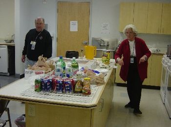 Mr. Gary and Ms. Carol prepare the kitchen:
