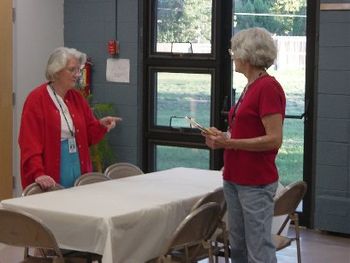 Miss Carol and Miss Pam talk over last minute details:
