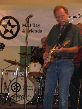 Steve Gibson playing lead guitar
