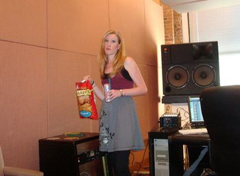 Tara displaying just a couple of the healthy snacks we all bring to the studio... Chips and Red Bull...
