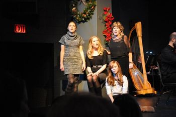 Ryann Angelotti, Tara Hawley, Libby Merriman, and Caitlin Houlahan singing "Hard Candy Christmas"
