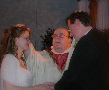 Fr. Tom DiLorenzo saying the final blessing at Alan & Nancy's wedding.  Fr. Tom contributed two original songs to the "Like A Deer" CD.
