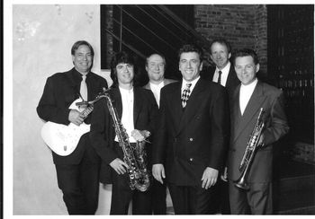 At Il Panino in Boston sometime in 1996 I believe. From left: Peter Bell, Steve Tully, Larry Luddecke, me, Richard Gates, Joe Casano. Larry Finn not in photo. Ace photographer Jean Hangarter behind th
